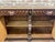 Circa 1890 French Renaissance Revival carved oak sideboard featuring highly ornate, deep dimensional wood carvings...
