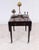 Elegant Georgian mahogany Pembroke table featuring twin drop leaves above a frieze drawer with original brass handles...