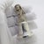 A beautiful vintage object in the form of a bell with an angel figure, crafted in Florence, Italy between the 1980s and...