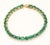 This is part of Chairish’s Fine Jewelry assortment. Green Emerald Tennis Bracelet in 14K Gold. It has a perfect oval cut...