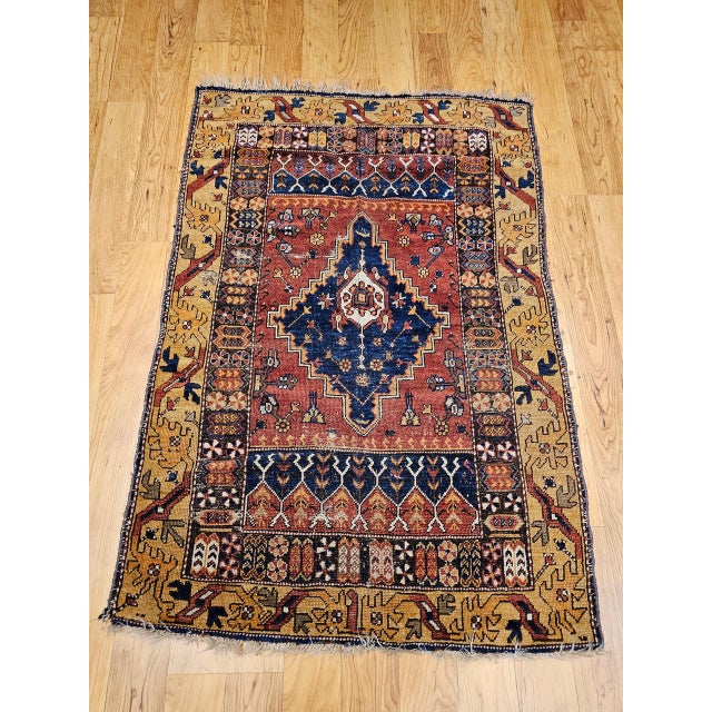 This exceptional 19th Century Anatolian village rug is a striking example of traditional Turkish weaving, showcasing the...
