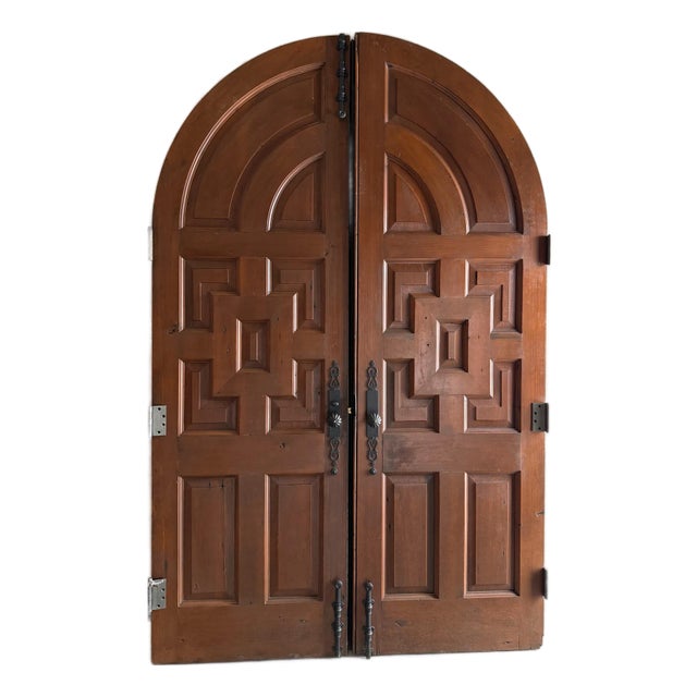A Pair of Arched Paneled Church Doors For Sale