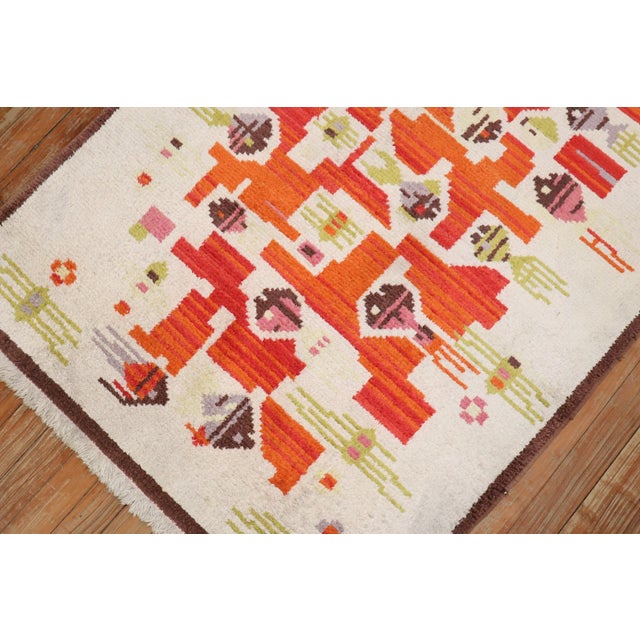 3rd quarter of the 20th century Tibetan scatter rug with an abstract pattern on an ivory field