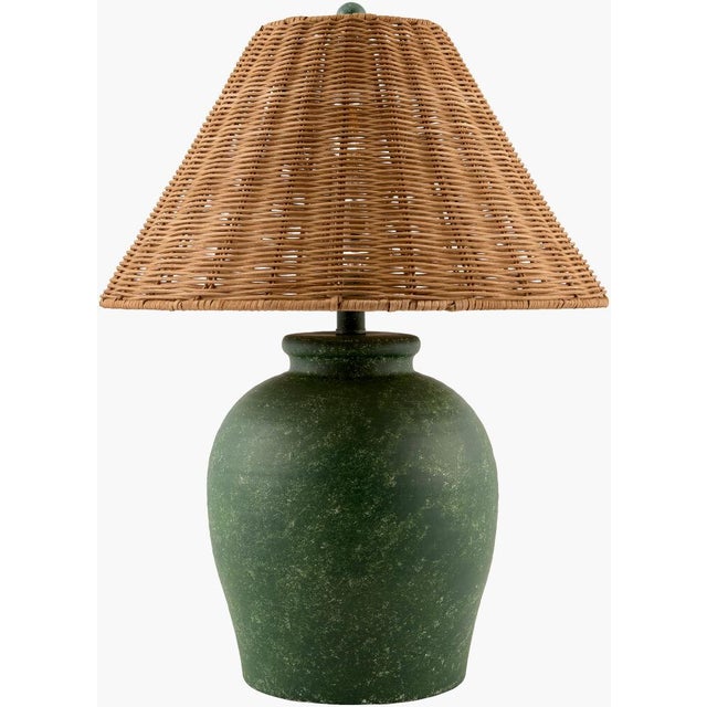 Illuminate your space with the Besson accent table lamp, a charming blend of rustic and traditional style that...