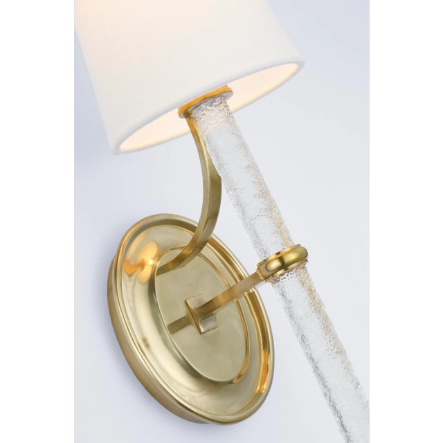 Abigail Large Sconce in Soft Brass and Clear Wavy Glass with Linen Shade Designer: Marie Flanigan Height: 18" Extension:...