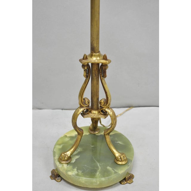 Antique Art Deco Brass & Green Onyx Pole Floor Lamp. Circa Early 20th Century. Measurements: 68 H (to finial) x 55" H (to...