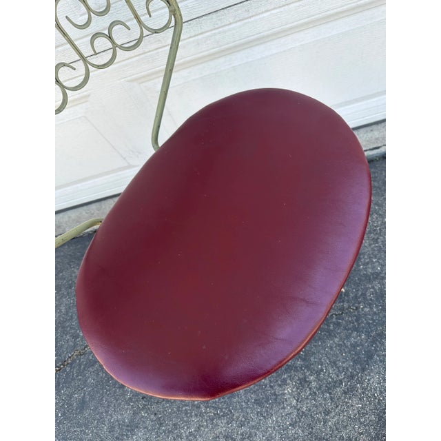 Great vintage swivel iron chair designed by Arthur Umanoff. So much character. Perfect for that mid- century style home....