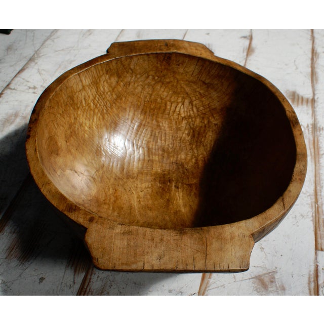 A Primitive Hand Carved Oak Wood Bowl. Carved from bog wood (Oak) with fine graining and excellent patina. This bowl has...