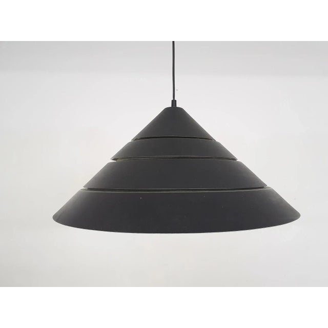 Black metal pendant light by Hans Agne Jakobsson. In good vintage condition. Hans Agne Jakobsson Hans-Agne Jakobsson was a...