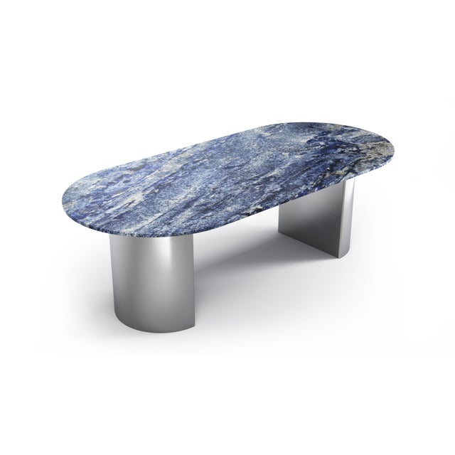 Our Refleko luxury table, with its oblong shape, evokes the reflections of sunlight on dormant quarries, perpetuating the...