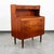 Outstanding Danish modern secretary desk. Comes with sliding drawers and teak handles throughout + a slide out desk...