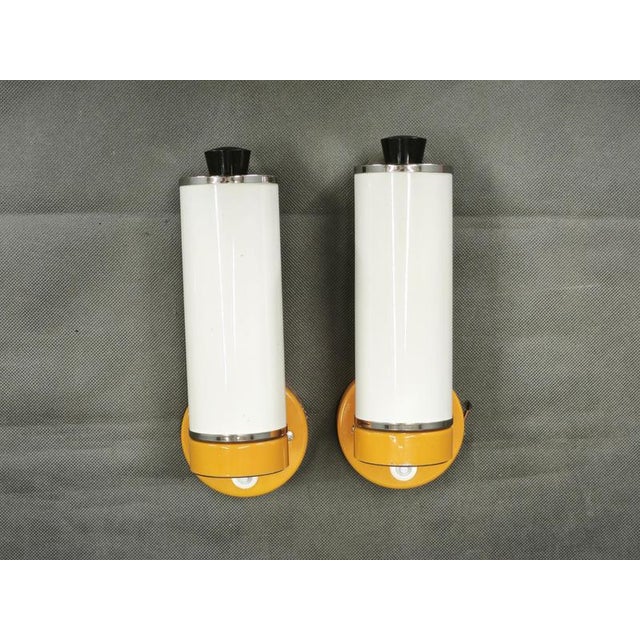 Rare pair of adjustable wall lights designed by Josef Hurka and manufactured by Napako, Czechoslovakia, during the 1950s....