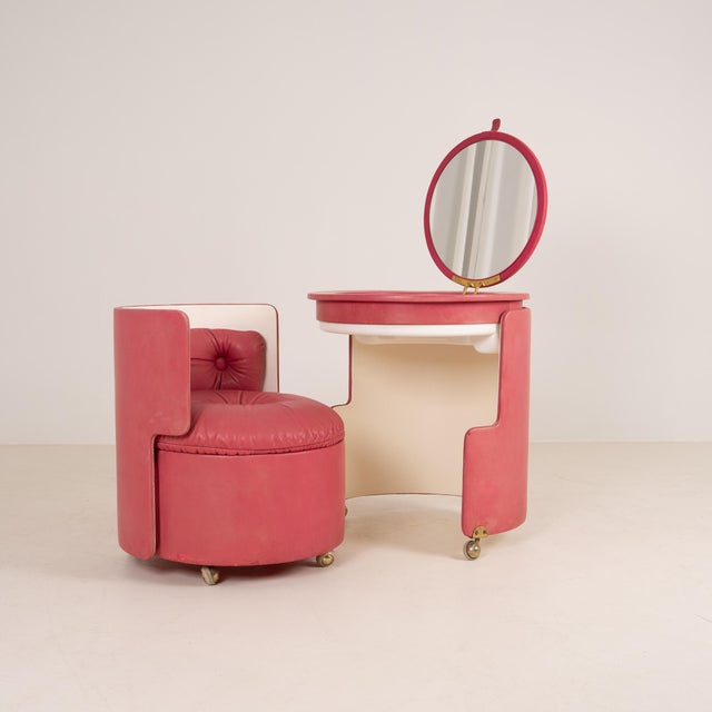 A rare and refined example of Italian Space Age design, featuring the soft sculptural lines and playful functionality...
