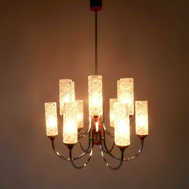 Mid-Century Teak Chandelier, 1960s, in Very Good conditions. Designed 1960 to 1969 European Plug (up to 250V).The wiring...