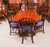 This is a fabulous high quality antique flame mahogany Regency revival twin pillar dining table and a set of ten...