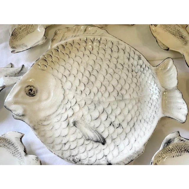 Fish Tray With Serving Dished- Set of 8. The serving dish is 10X11" and the individual dishes are 5.5x3". Stamped on the...
