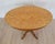 Made in Sweden around 1880, this oval occasional table is constructed in solid birch. Birch, a pale, fine-grained timber,...