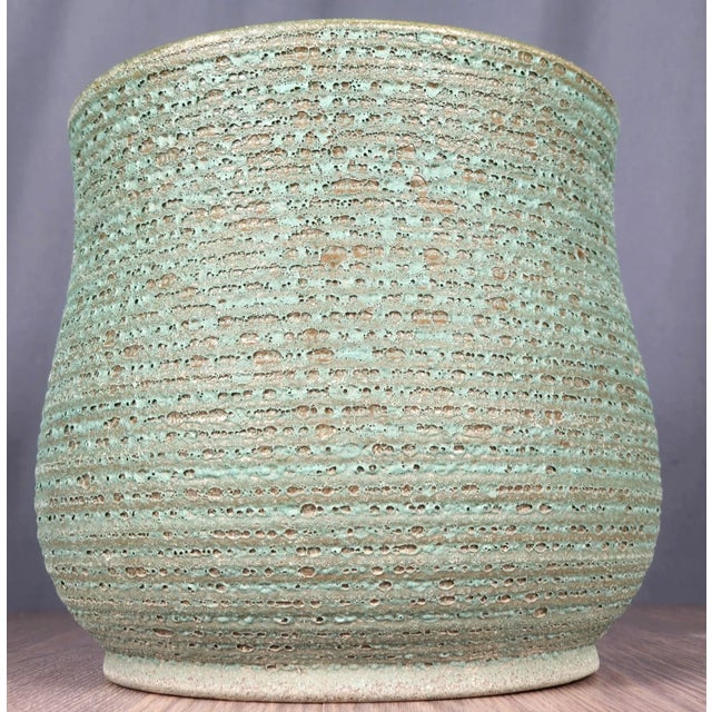 Large scale pottery planter with a first-rate volcanic crater glaze in green. This is not marked, not signed. Vintage find...