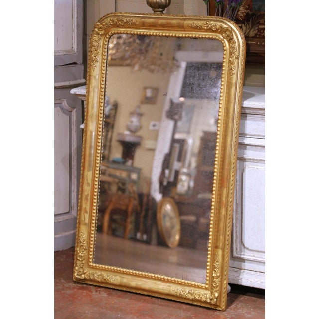 This refined antique wall mirror was crafted in France circa 1860 and exemplifies the understated elegance of the Louis...