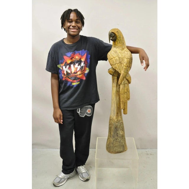 Large 46" Vintage Mid Century Modern Carved Wood Perched Parrot Bird Statue Sculpture. Item features solid wood...