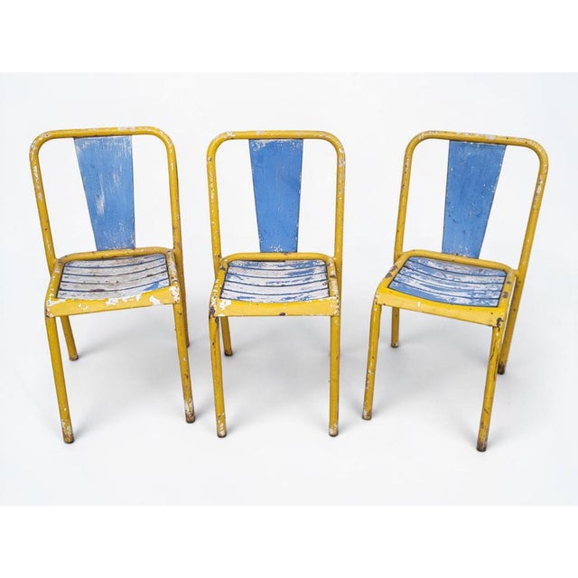 Three Tolix Xavier Pauchard T4 chairs - 1950s In original condition but good overall / Original paint. Height 81 cm Seat...