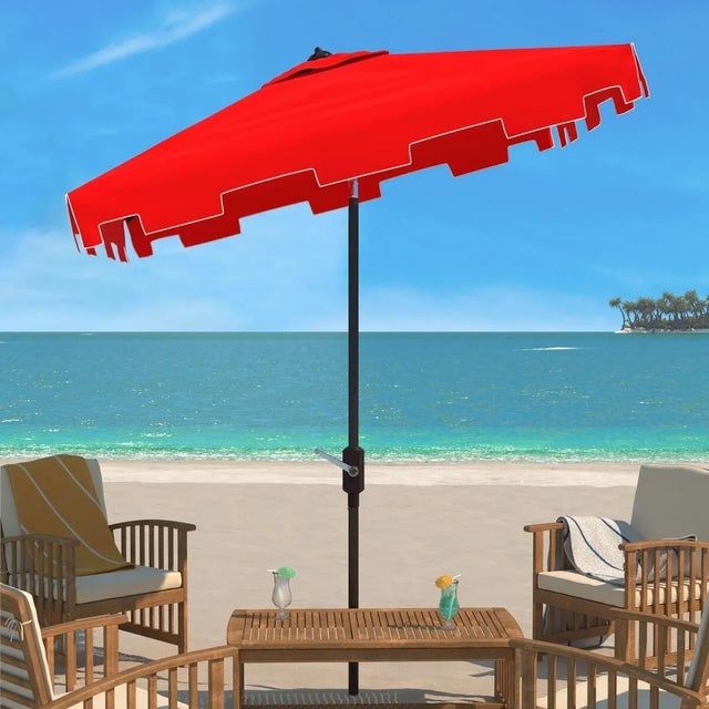 A classic market umbrella gets a chic makeover in forever fashionable red and white with a stylish valance for extra sun...