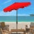 A classic market umbrella gets a chic makeover in forever fashionable red and white with a stylish valance for extra sun...