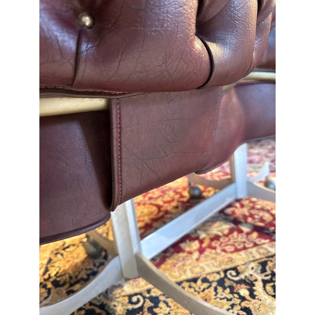 Elevate your space with this striking vintage industrial settee by Gasser Chair Co., Inc., crafted in Youngstown, Ohio....