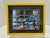 Lot of three contemporary portrait works, each framed in a bold yellow frame. No artist signature. The group includes...