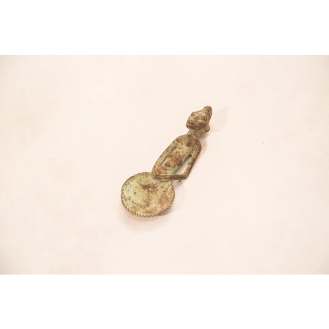 :: Vintage handmade Ashanti bronze gold weight (also known as Mbramoo) in the shape of a woman with lovely blue-green...