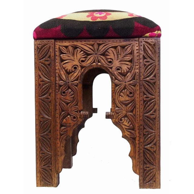 This stool is made of original handmade Suzani and solid wood. It is a Suzani stool upholstered with of an Old Suzani. It...