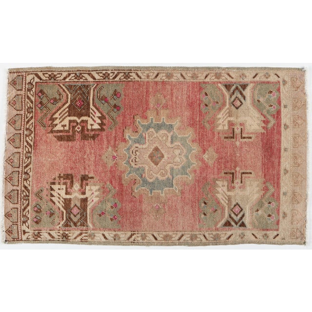 Vintage Turkish Door Mat Rug – Reddish Ground With Medallion & Muted Florals -1' 9'' X 3' 7'' Infuse your space with...