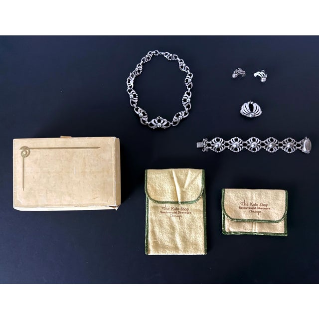 A rare full set of sterling jewelry suite by the Kalo Shop in Chicago circa 1920s. The set consists of 5 matching pieces...