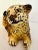 The most adorable small glazed terracotta ceramic baby leopard cub figuarine. Modeled in a resting position scratching...