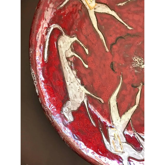 A fantastic and rare ceramic charger by Eugenio Pattarino. Vibrant red color and Classic Italian Mid-Century style is...