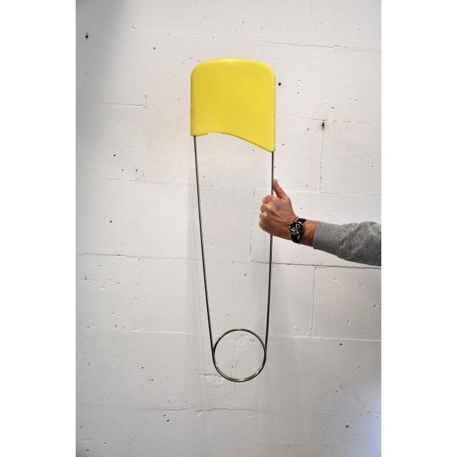 This is a huge safety pin from Think Big.