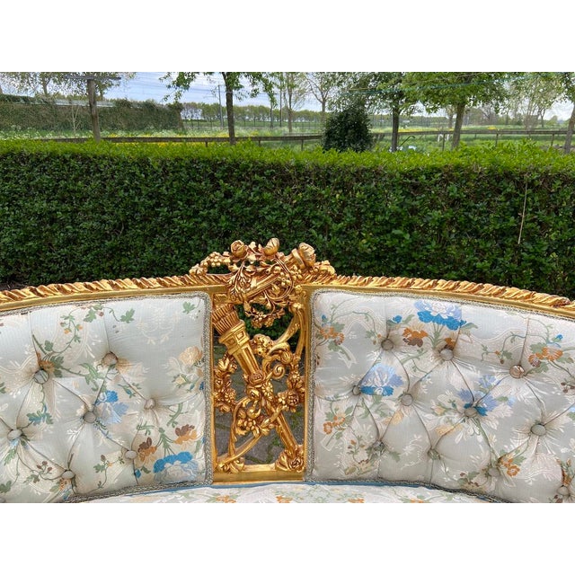 This elegant late 20th-century French settee is a refined interpretation of the Louis XVI style, combining classical...