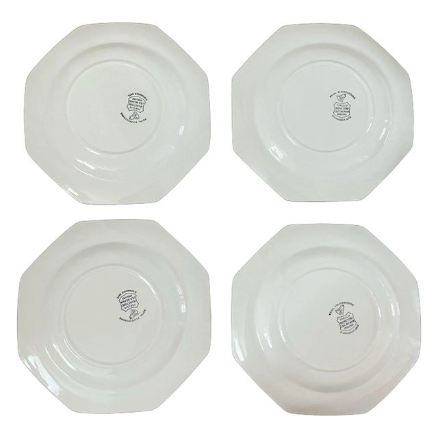 Add a touch of mid-century modern charm to your dining table with this set of four octagonal dinner plates from J & G...