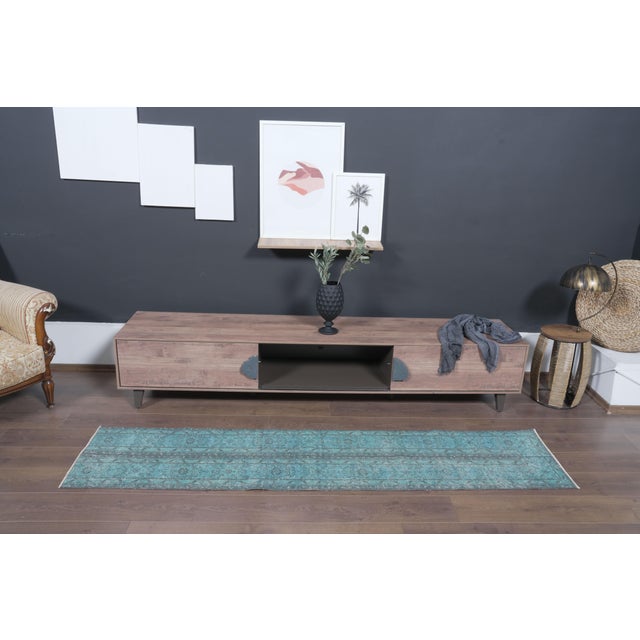 Type: Vintage Overdyed Runner Rug Origin: Anatolian / Turkish (Handwoven) Technique: Hand-Knotted, Shaved / Distressed Low...