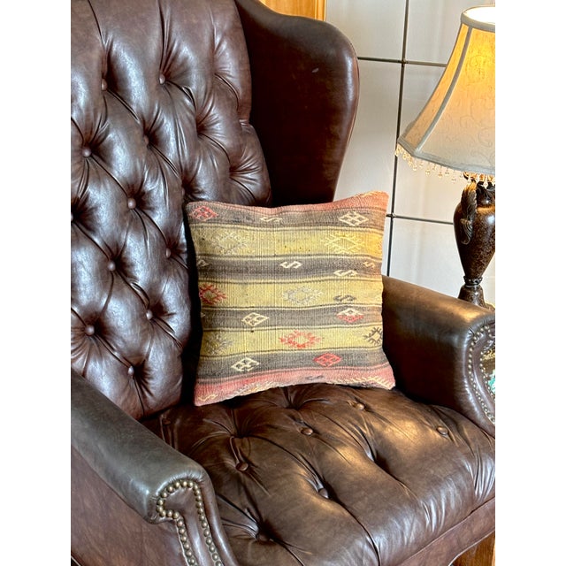 An exceptionally pretty vintage Turkish Kilim decorative accent throw pillow. The front face is masterfully upcycled from...