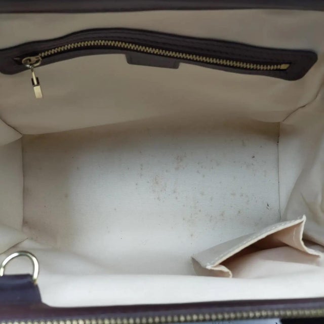 This elegant Louis Vuitton Josephine PM is a refined take on the classic doctor-style satchel, featuring the sophisticated...