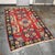 Design Plus Gallery presents a 7ft 2in × 10ft 4in Turkish Kilim Area Rug. This handwoven flatweave rug has a red field...
