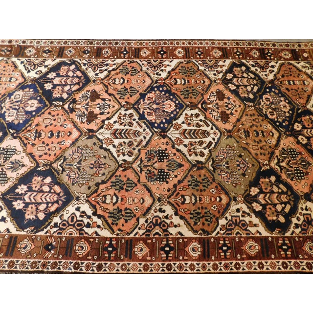 Vintage Persian Bakhtiar rug. wool on cotton foundation. Hand made. Garden panel style. 5'9"x 10'9"