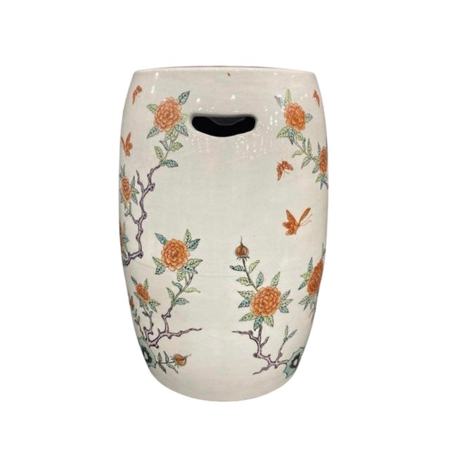 A vintage, 20th century, Famille Verte garden stool. Features hand painted details depicting branching florals and...