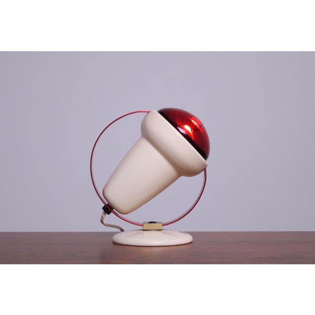 Original Philips Infraphil 7529 infrared heat lamp with its distinctive red aluminium handle and adjustable cream white...