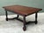 This magnificent refectory-style dining table is a masterclass in traditional European craftsmanship. Featuring a robust...