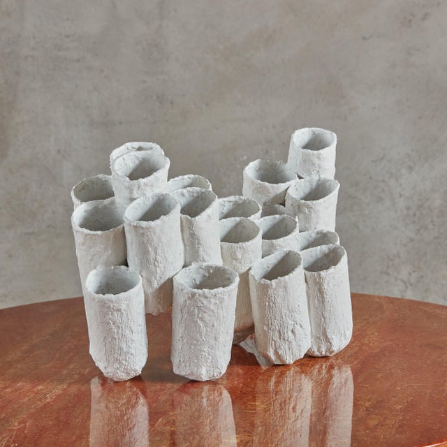 A textural table sculpture made from paper tubes, aqua resin, and acrylic by Canadian artist Erin Vincent. Erin Vincent is...