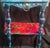 Bring a bold burst of maximalist character to your space with this stunning, custom-upcycled vintage accent table. Hand-...