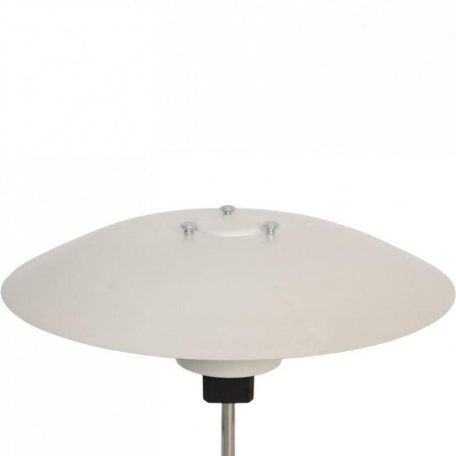 Poul henningsen ph4/3 table lamp with a metal shade and chrome base. The lamp is from around the 1990s and appears in good...