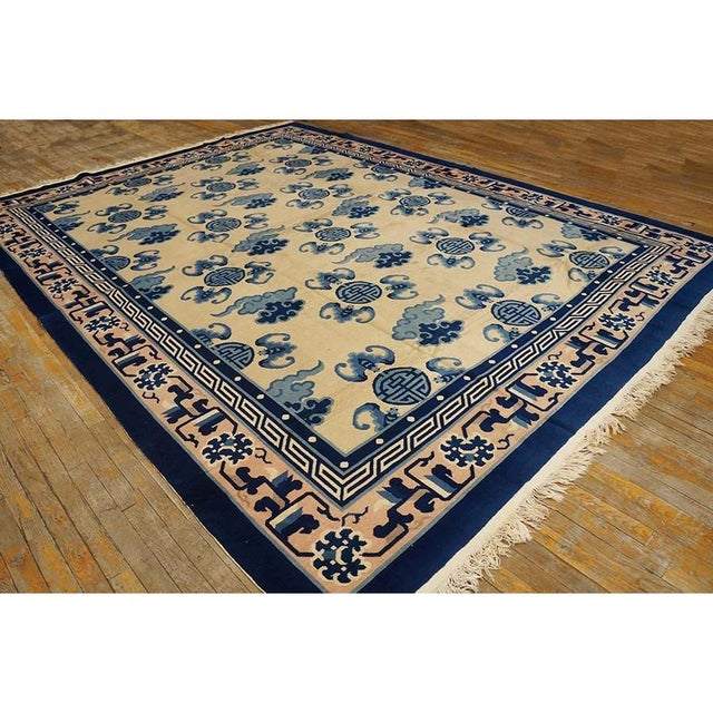Vintage Peking Medium Wool Beige Rug, Country of Origin: China, Circa Date: 1980s. This elegant example of Chinese weaving...